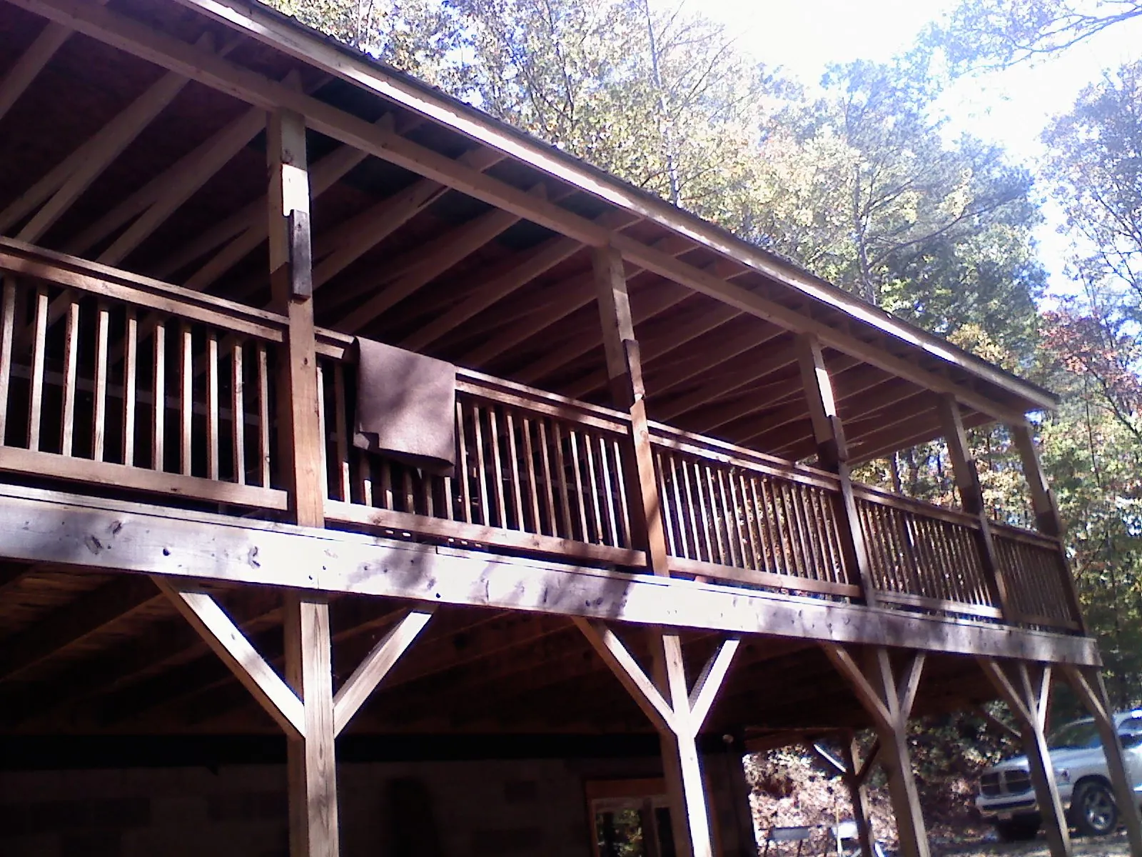 Timber framing under a new elevated porch and deck — Roof Leak Repair in Collins by Roofing Brothers